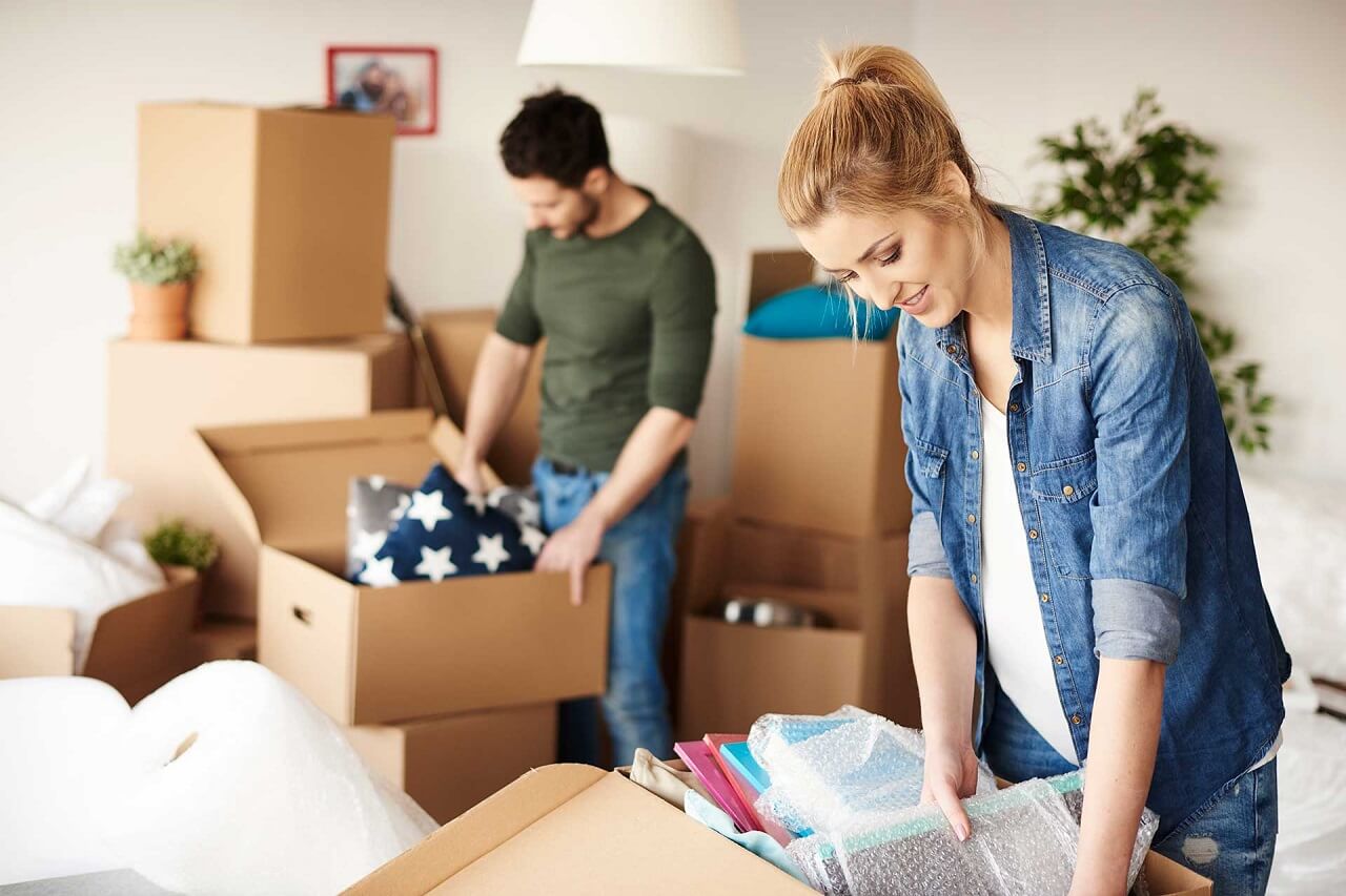 couple decluttering their home